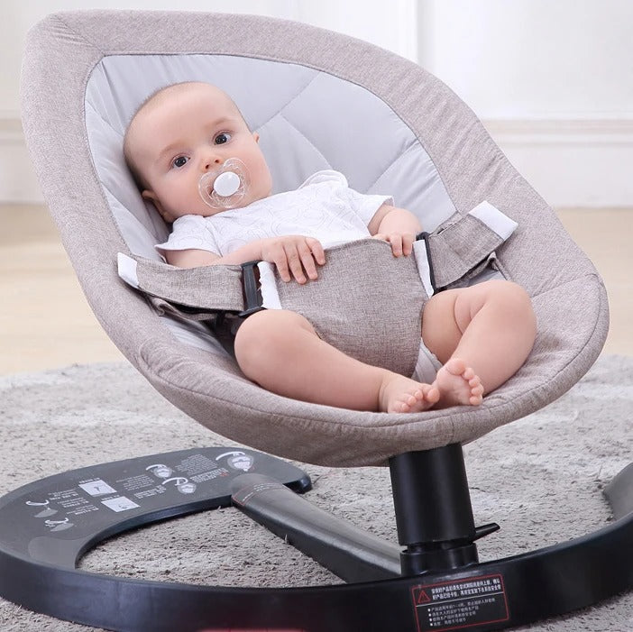 Babyschaukel mit rotierendem Funktion und hängende Spielzeuge